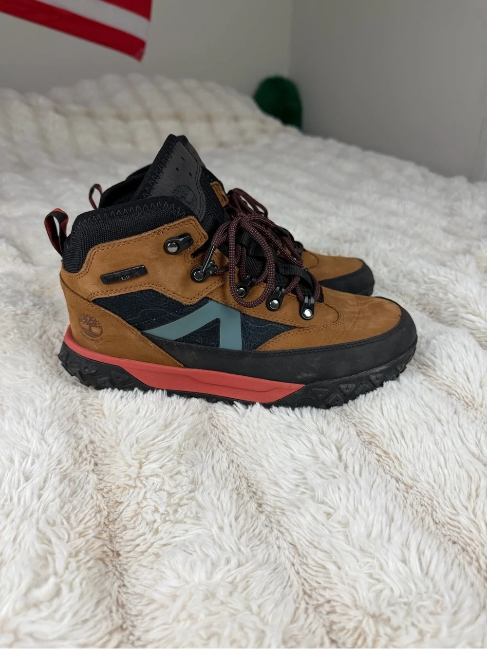 Timberland Kids Brown and Black Boots with Coral Midsole and Teal Accent